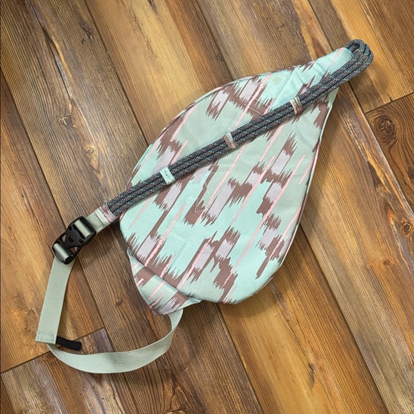 KAVU Rope Sling bag in a light aqua, pink, and brown ikat-style pattern - Picture 2 of 3